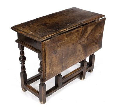 Lot 1010 - A William and Mary single-flap gateleg table...