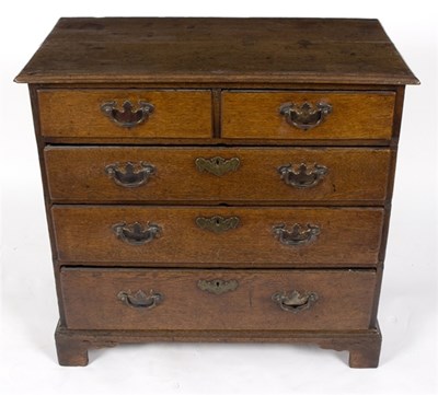 Lot 1014 - An 18th Century oak chest of two short over...