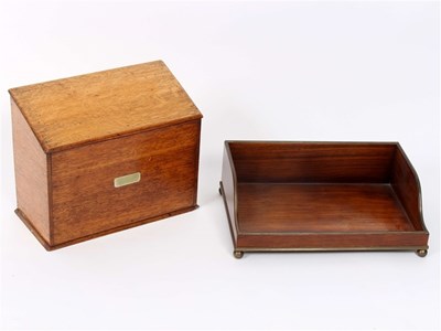 Lot 1018 - A brass mounted letter tray on ball feet,...