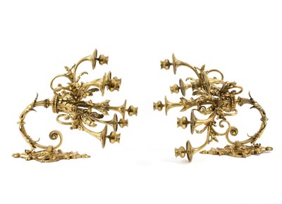 Lot 1023 - A pair of gilt metal five-branch, six-light...