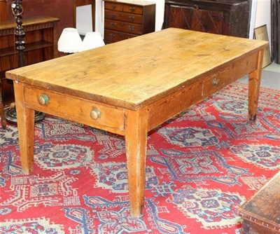 Lot 1026 - A large pine kitchen table with five-plank top,...
