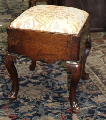 Lot 1033 - An 18th Century oak stool on cabriole legs...