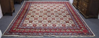 Lot 1044 - An Indian carpet, circa 1900, with ivory main...
