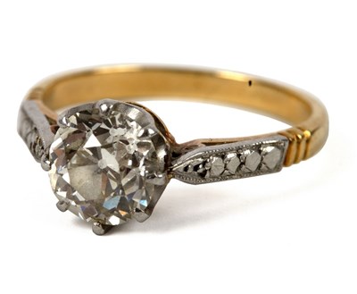 Lot 11 - A solitaire diamond ring, the cushion shaped...