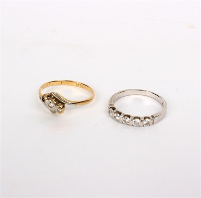 Lot 16 - A five-stone diamond ring set in 14k white...
