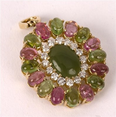 Lot 37 - An oval diamond and gem set cluster pendant,...