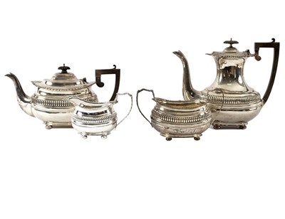 Lot 110 - A four-piece silver tea and coffee set, George...