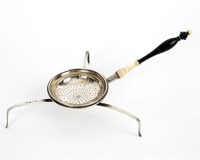 Lot 133 - An unusual silver tea strainer, circa 1888,...