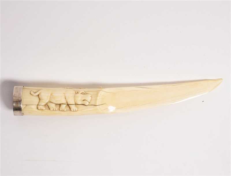 Lot 146 - An early 20th Century ivory letter opener...