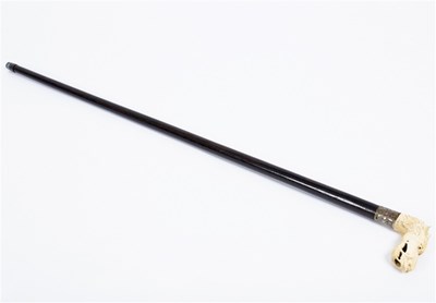 Lot 174 - An rosewood walking stick, the carved ivory...