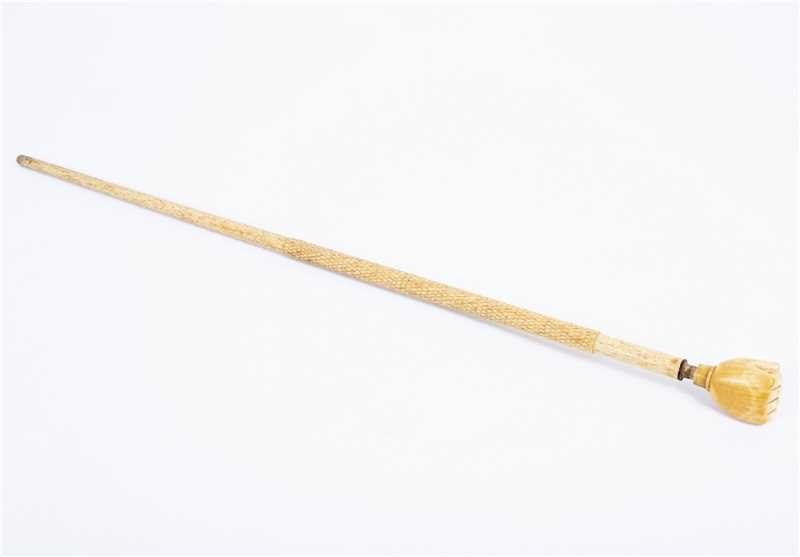 Lot 176 - A whalebone walking stick with carved...