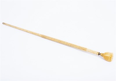 Lot 176 - A whalebone walking stick with carved...