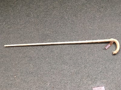Lot 185 - A Indian knotted ivory walking stick, the loop...