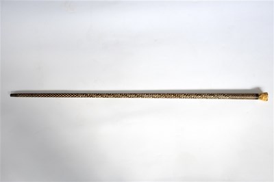 Lot 189 - An Indian walking stick inlaid foliate and...