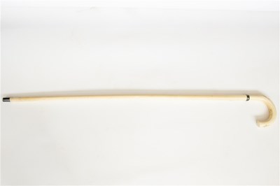 Lot 190 - A Canton ivory walking stick, the loop handle...
