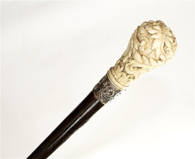 Lot 193 - An simulated rosewood walking stick with...