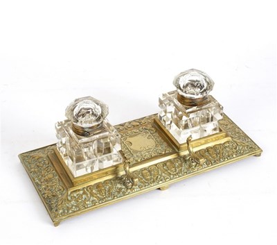 Lot 420 - A brass inkstand, fitted two cut glass...