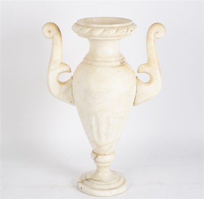 Lot 431 - A twin-handled alabaster urn with flanged top...