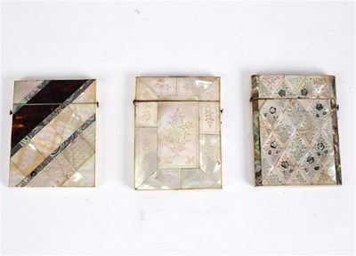 Lot 438 - Three mother-of-pearl visiting card cases,...