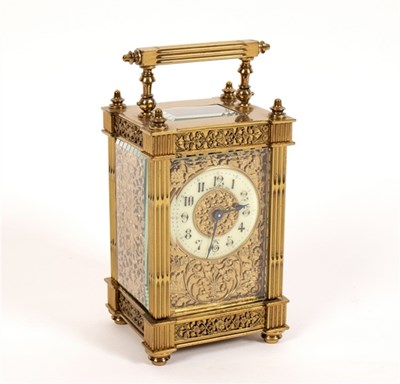 Lot 447 - A gilt-brass eight-day carriage clock with...