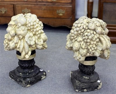 Lot 457 - Two painted reconstituted stone gate post...