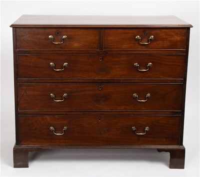 Lot 477 - A George III mahogany chest of two short over...