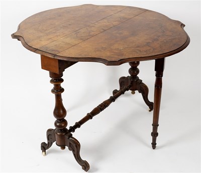 Lot 479 - A Victorian walnut Sutherland table of...