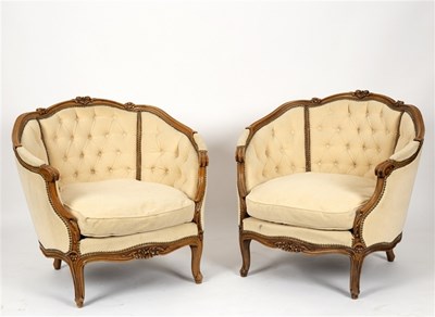 Lot 485 - A pair of walnut upholstered armchairs with...