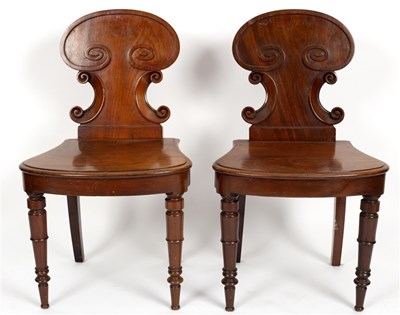 Lot 486 - A pair of Victorian mahogany hall chairs with...