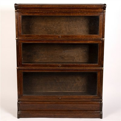 Lot 489 - An oak Globe Wernicke bookcase, of three...