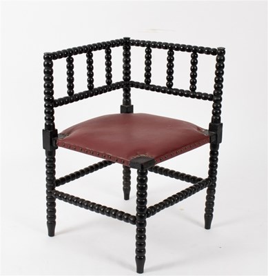 Lot 490 - A William Morris Sussex style ebonised chair,...