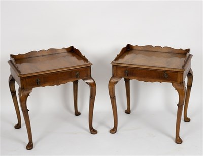 Lot 511 - A pair of reproduction walnut single drawer...