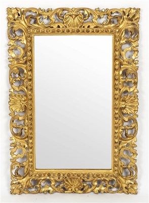 Lot 512 - A Florentine gilt frame, later mirror plate,...