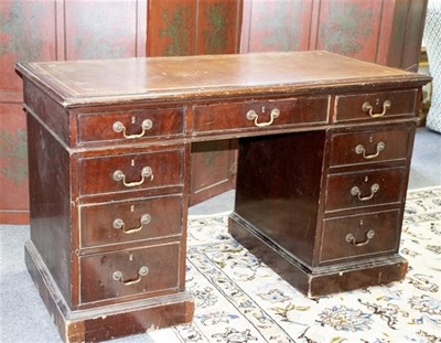 Lot 525 - A mahogany twin pedestal desk with leather set...