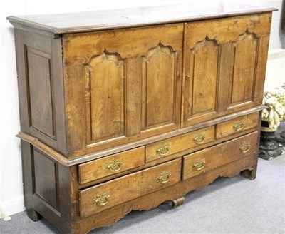 Lot 535 - An 18th Century oak mule chest, the now fixed...