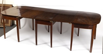 Lot 545 - A George III mahogany D end dining table on...