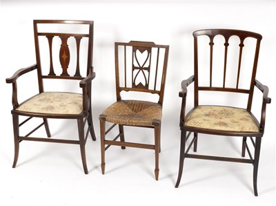 Lot 546 - Two Edwardian mahogany elbow chairs with...