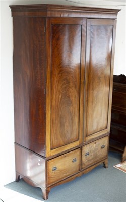Lot 560 - A late Georgian mahogany wardrobe on...