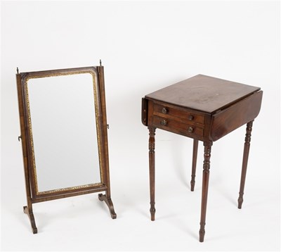 Lot 567 - A George IV mahogany two-flap work table,...