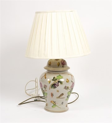 Lot 587 - A vase shaped floral table light with shade