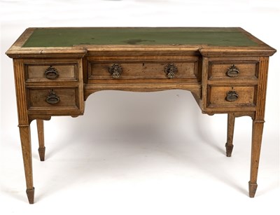 Lot 594 - An early 20th Century breakfront writing table,...