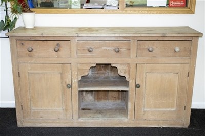 Lot 599 - A Victorian pine dresser fitted drawers and...