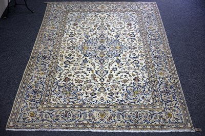 Lot 620 - A Nain rug, the foliate field to a cream...