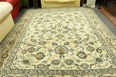 Lot 621 - A Nain carpet, the foliate field to a cream...