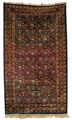Lot 625 - A Kashan silk rug, the floral field to...