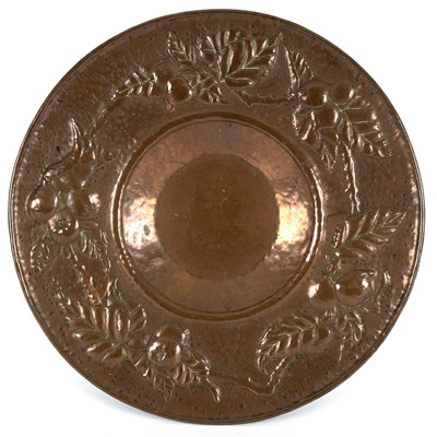 Lot 106 - A Newlyn School copper charger, repoussé...