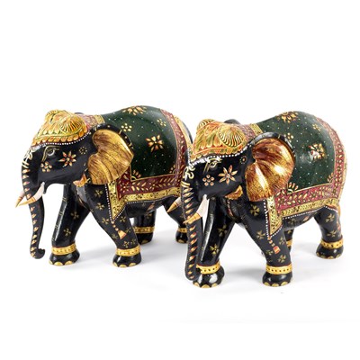 Lot 121 - A pair of painted and gilded wood Indian...