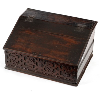 Lot 49 - A carved oak bible box, 57cm wide