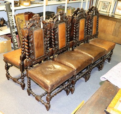 Lot 53 - Eight Carolean style dining chairs with carved...