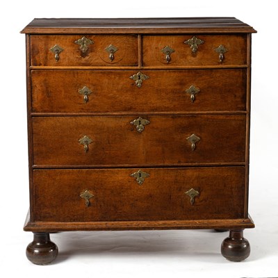 Lot 61 - An early 18th Century oak chest fitted three...